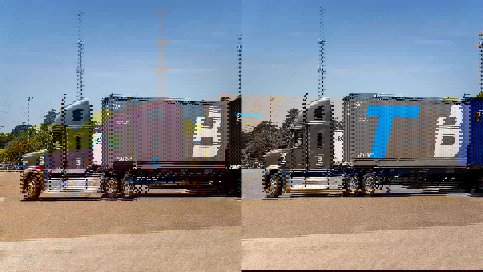 A trailer truck with a Trailer Bridge container.