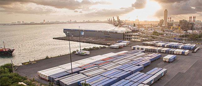Aerial photo Trailer Bridge barge in Puerto Rico at sunrise. 