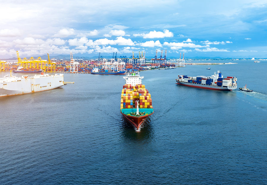 International shipping vessel leaving the port.