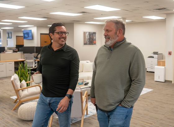 Trailer Bridge CEO, Mitch Luciano, walking with the President of the Ocean Division, Tony Kvasnicka.