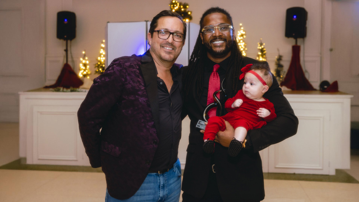 James Cox accepting award from Mitch Luciano