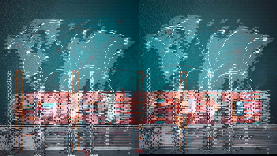 A map of the US overlaid on an overhead shot of a shipping barge carrying containers.